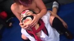 Two Japanese School Girl Wrestling